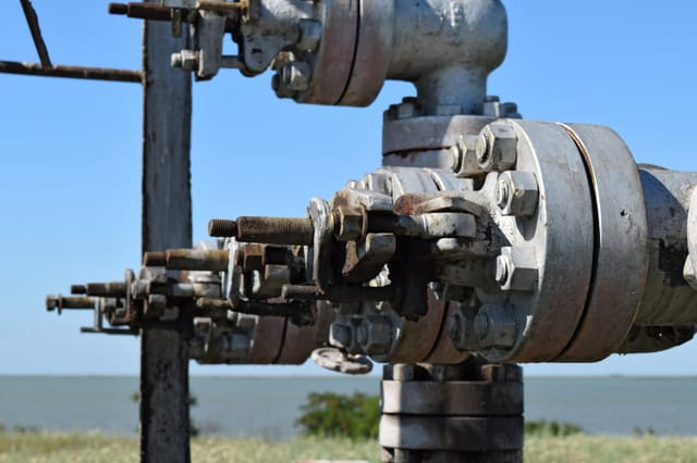 Flange F-3 on Pump P-204 with worn gasket visible at the joint